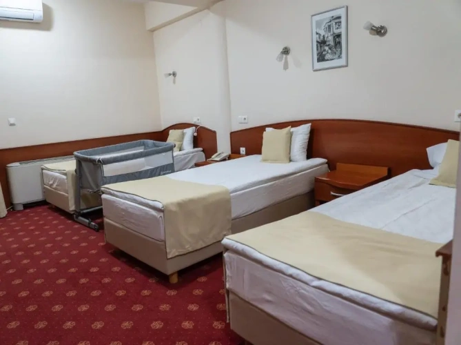 Standard Triple room with balcony