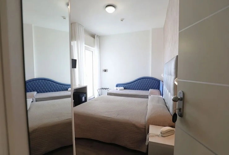 Standard Triple room with balcony and with sea view