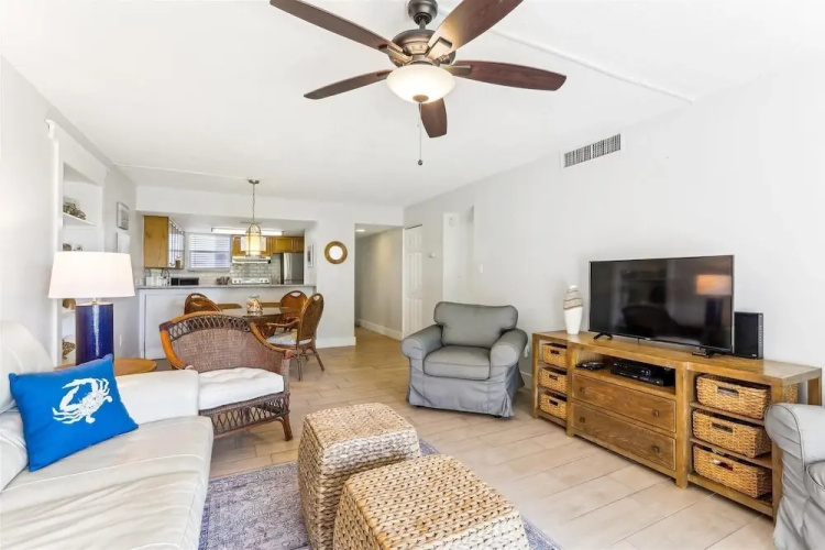 Beachfront Gem: Serene 2BD Haven With Pool & Views