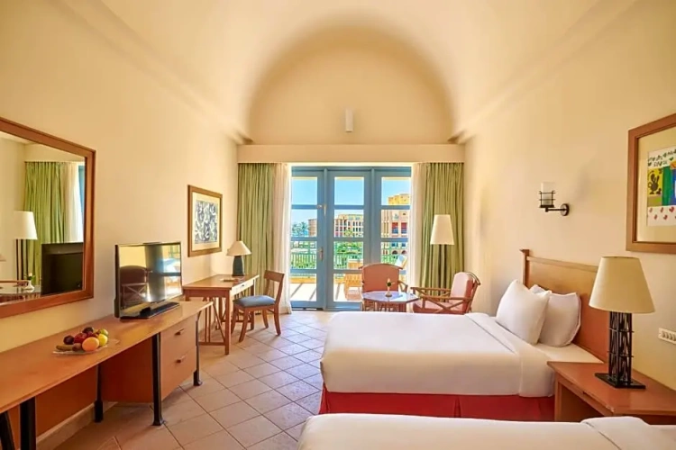 Twin room with pool and sea view