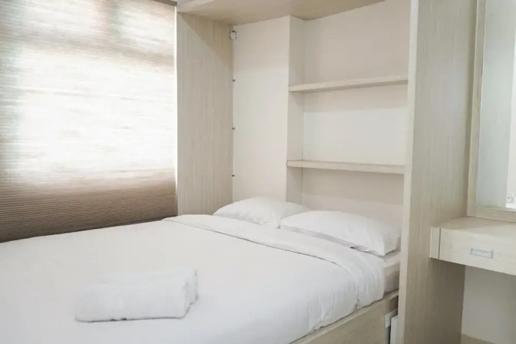 2BR Apartment with Sofa Bed at Green Pramuka City