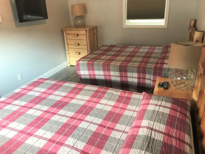 1 Bedroom Deluxe Basement Suite with balcony and with partial view