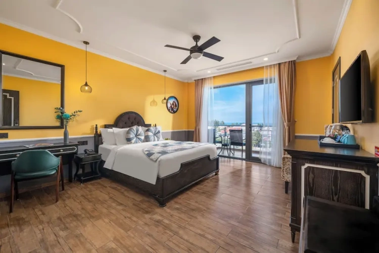 Deluxe Quadruple room with balcony and beachfront