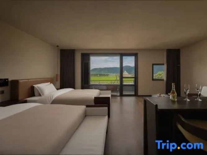 Deluxe Quadruple room with balcony and with garden view
