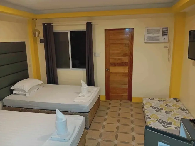 Deluxe Quadruple room with balcony