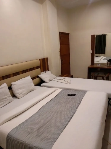 2 Bedrooms Deluxe Triple room with city view
