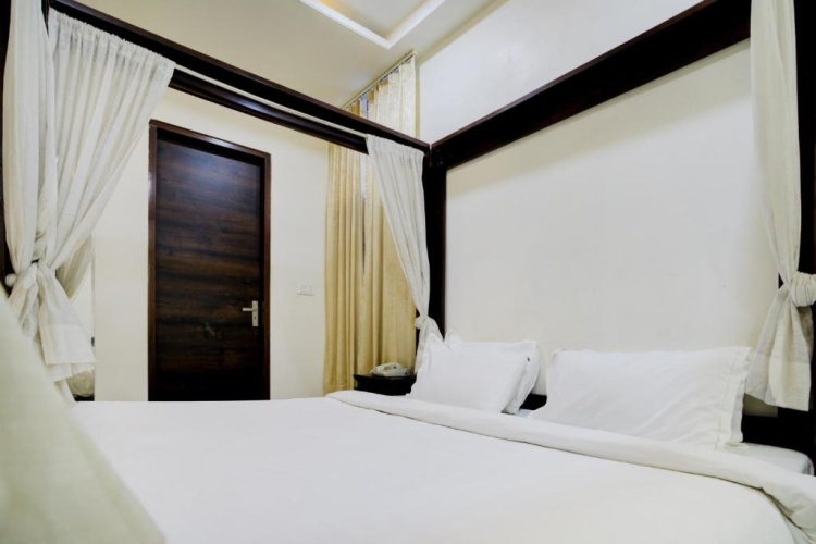 Standard Triple room with garden view