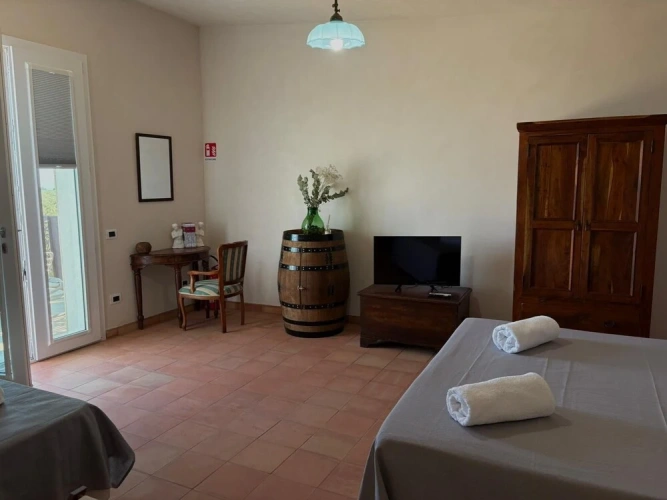 Deluxe Triple room with garden view