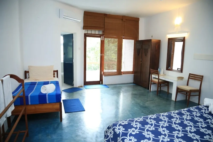 Standard Triple room with balcony and with garden view