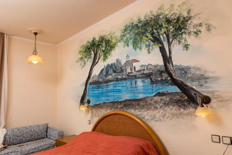 Standard Triple room with garden view