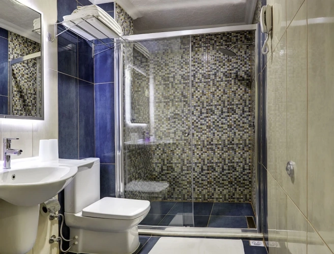 Superior Triple room with balcony and with pool view