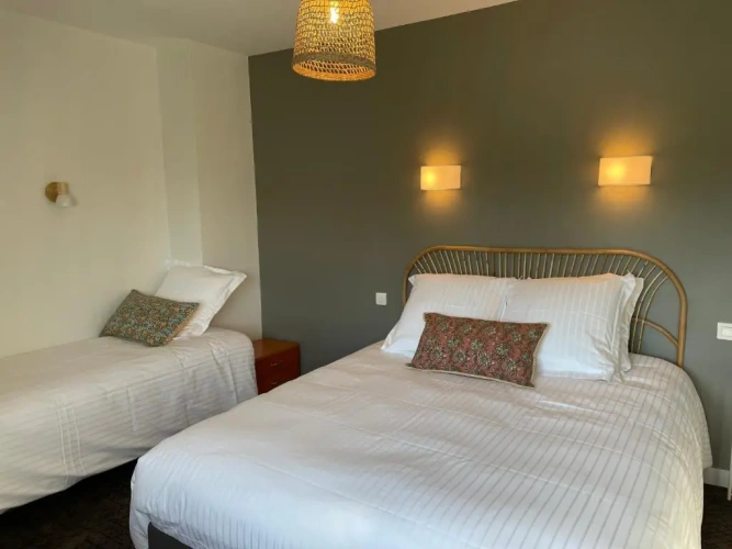 Standard Triple room with garden view