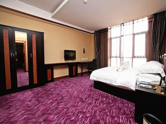 Maple Palace Hotel