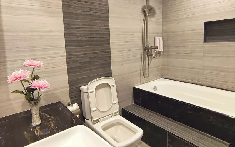 Deluxe Quadruple room with balcony