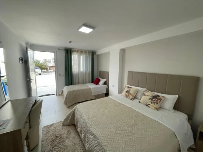 Standard Triple room with garden view