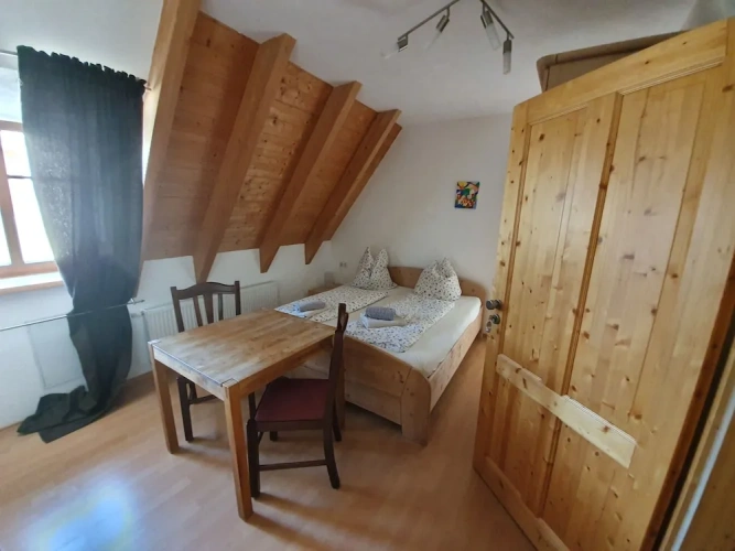 Standard Quadruple Family room with courtyard view
