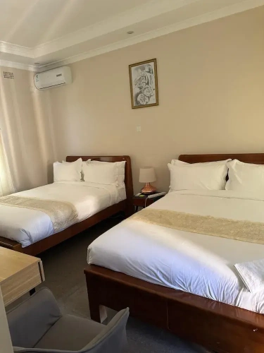 Executive Quadruple room with garden view