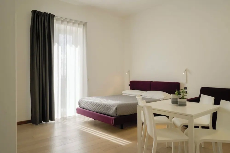 Standard Triple Family room with balcony and with courtyard view