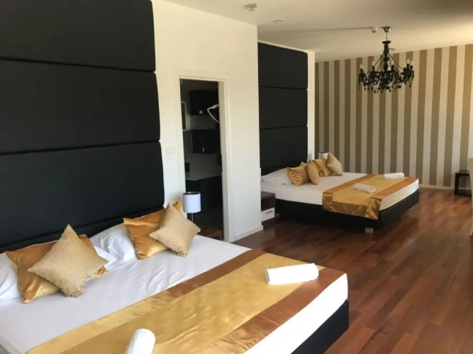 Deluxe Quadruple room with balcony and with sea view