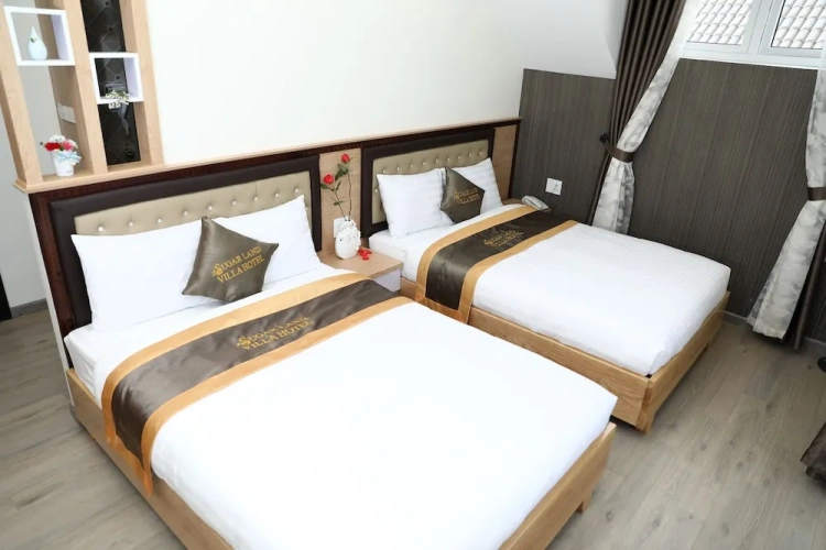 Deluxe Quadruple room with balcony