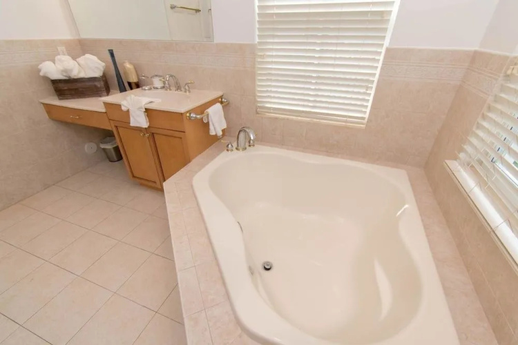 Gorgeous 5 Bedroom Home w/heated Pool Canal Front