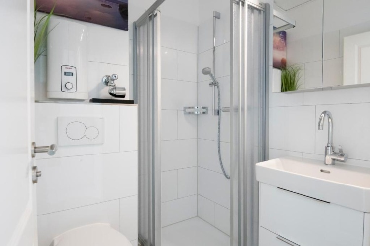 Badeweg 4 Sandkorn 1