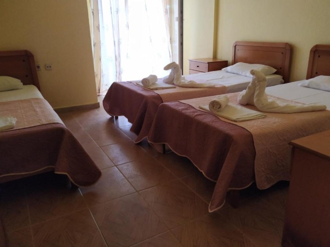 Standard Triple room with sea view