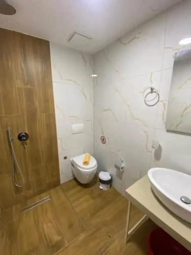 Standard Triple room with balcony and with garden view