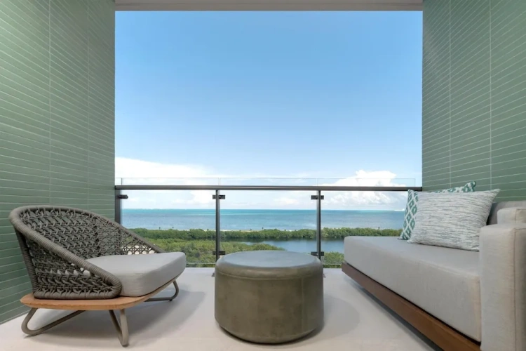 Standard Quadruple room with balcony and oceanfront