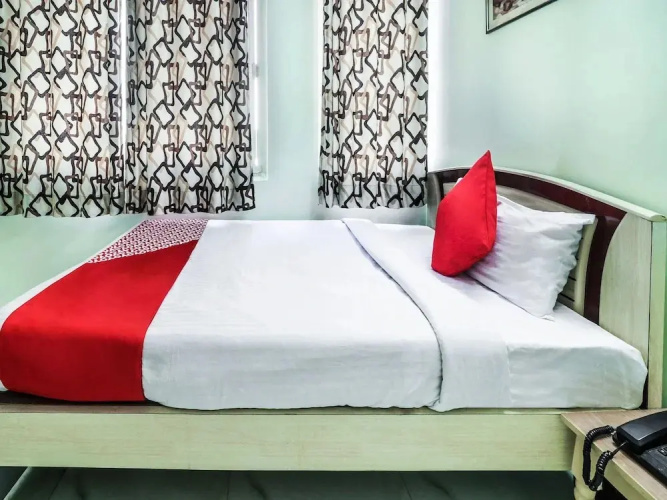 Om Hotel by OYO Rooms
