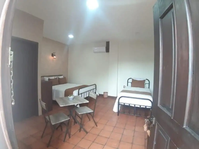 Standard Triple room with balcony and with courtyard view