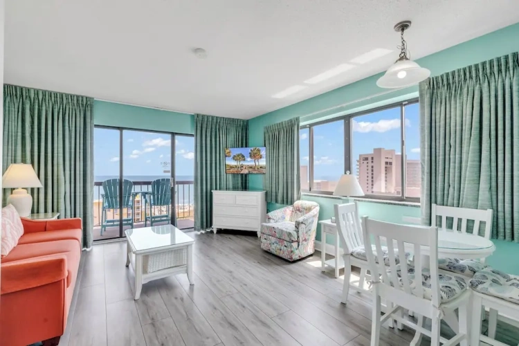 1 Bedroom Standard Family room with balcony and with partial ocean view