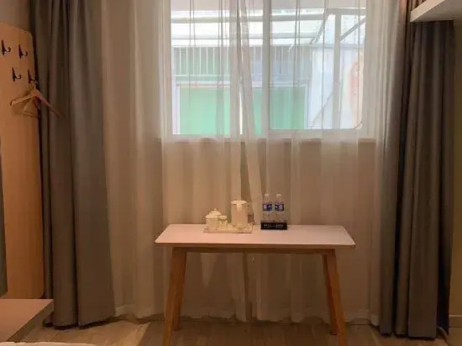 Linquan Aixin Hotel