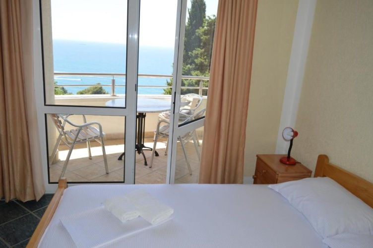 Standard Quadruple room with balcony and with sea view