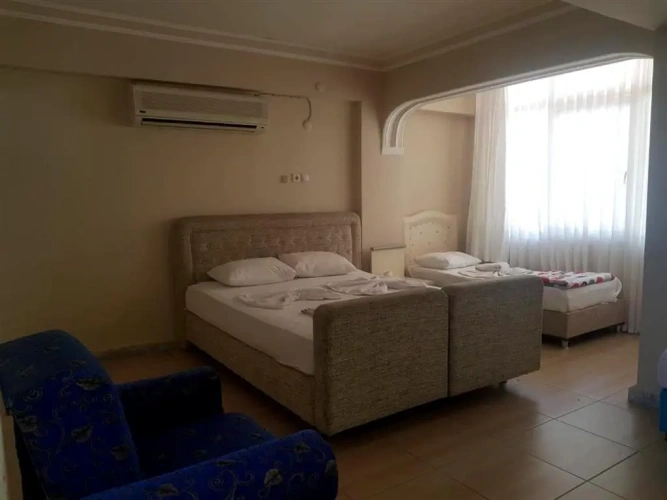 Standard Triple room with garden view