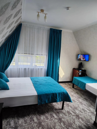 Фотография номера гостевого дома Март