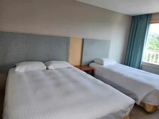 Deluxe Quadruple room with balcony