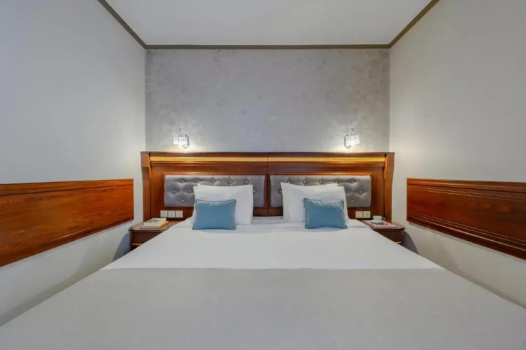 Superior Triple room with side sea view