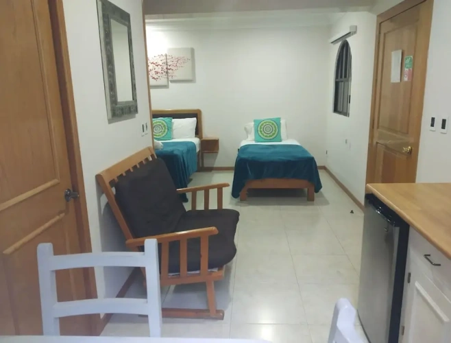 Standard Quadruple room with balcony and with garden view