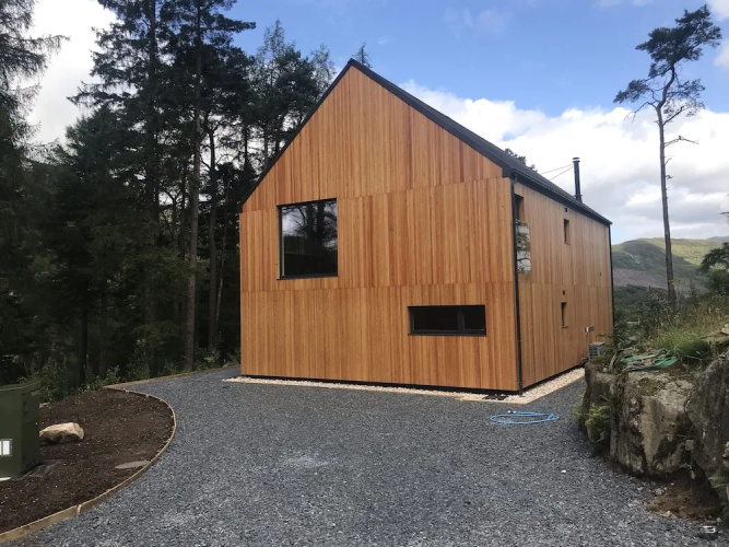 An Caisteal Lodge With Cascading Waterfall View