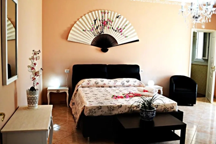 Standard Quadruple room with garden view