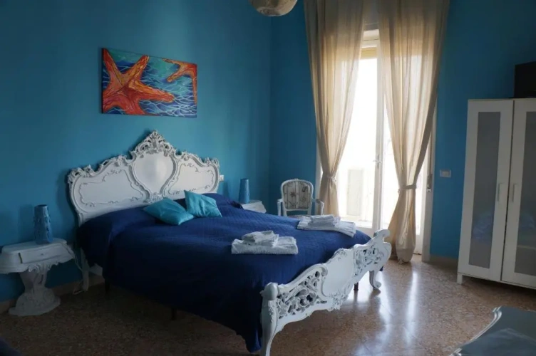 Standard Quadruple room with balcony and with sea view