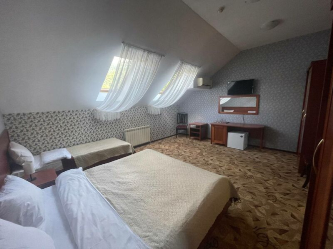Фотография номера гостиницы Утомленные Солнцем