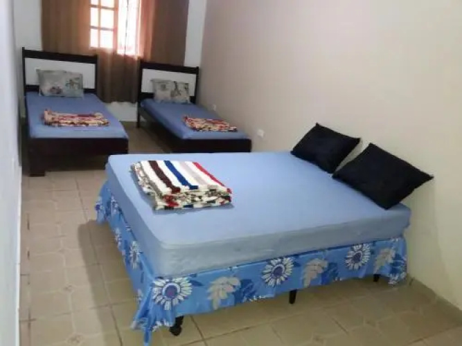SUíTE EM NOSSA CASA A 450M DA PRAIA