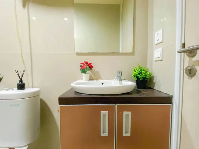 Simple 2Br At Azalea Suites Apartment