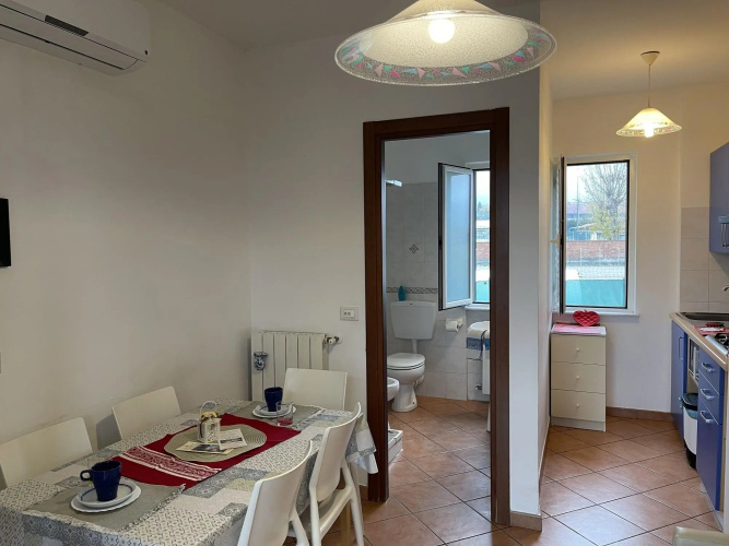 Snug holiday home in Loano with shared pool