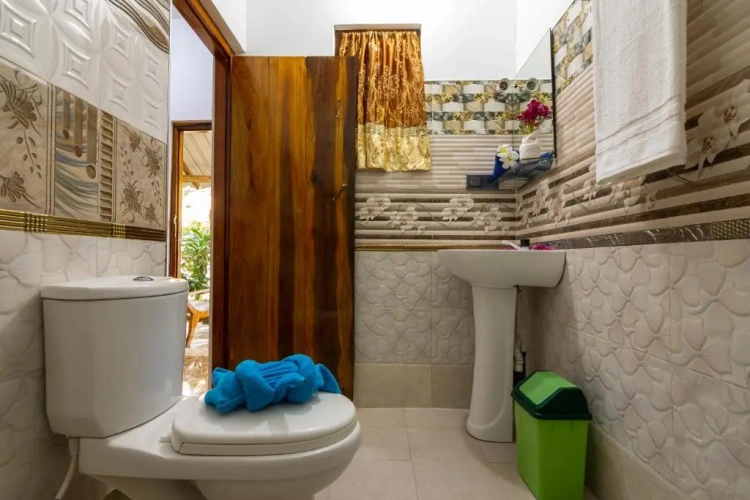 Standard Triple room with garden view