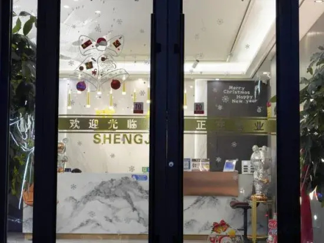 Xinle Shengjin Hotel