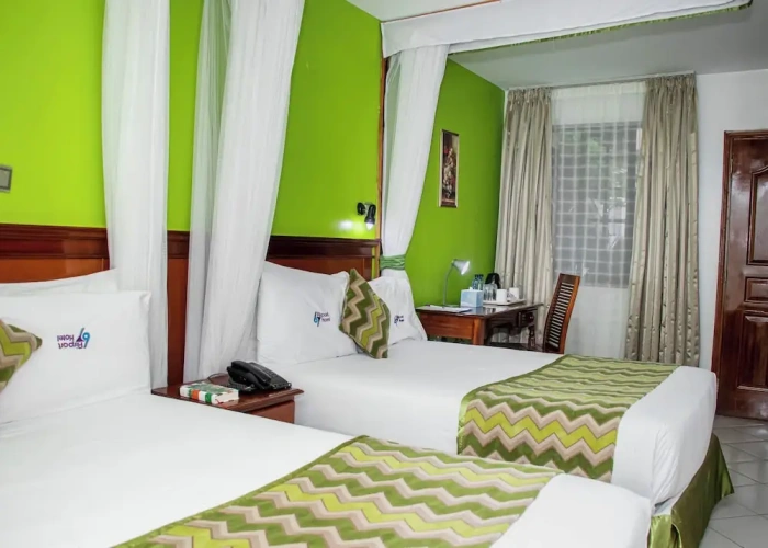 Standard Quadruple room with courtyard view
