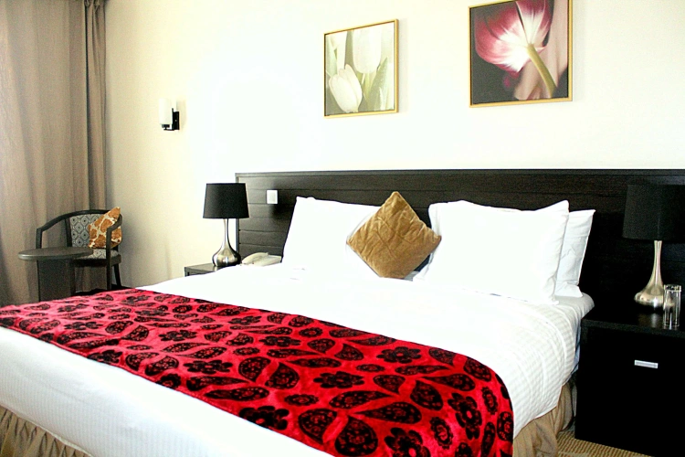 Deluxe Quadruple room with courtyard view